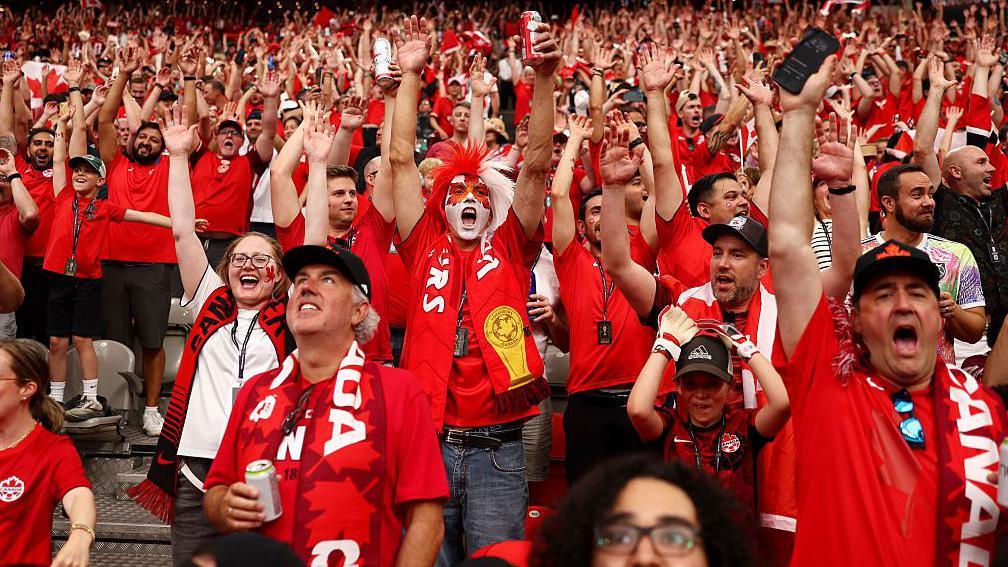 Canada fans celebrate beating Qatar