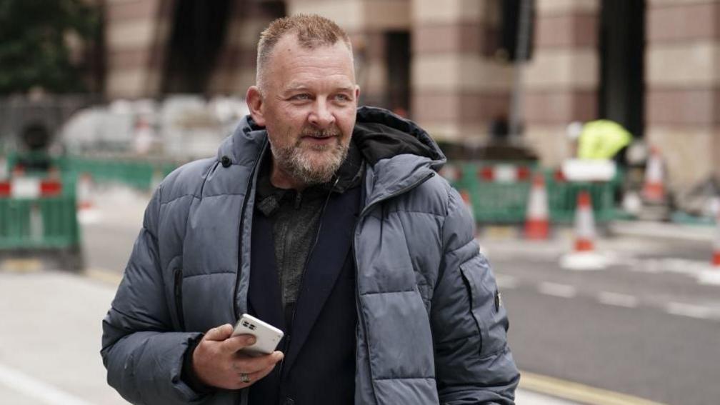 Simon Parry arrives at City Of London Magistrates' Court,