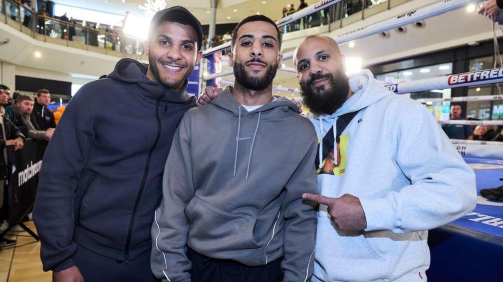 Galal Yafai posing with brothers Kal and Gamal 