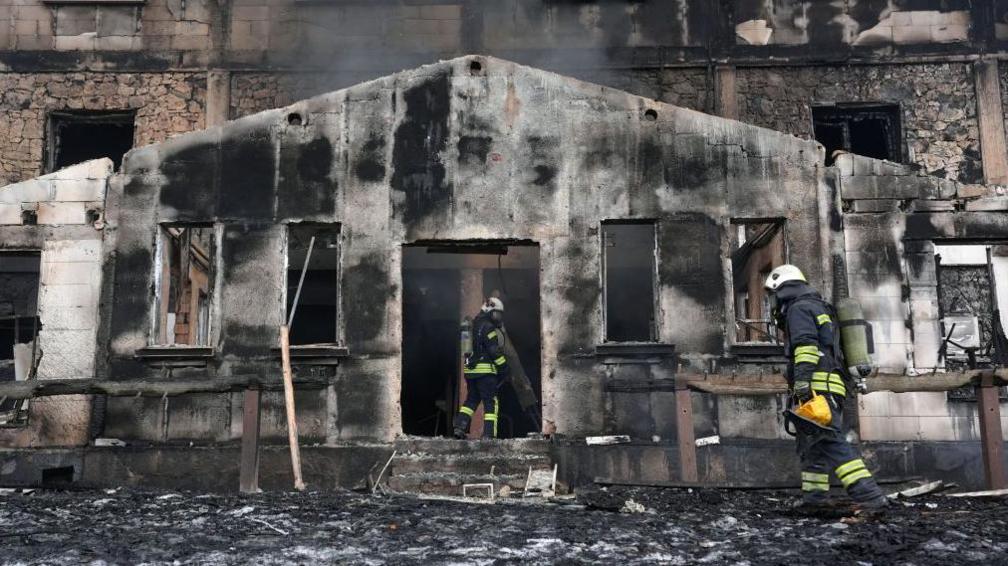 A view of a blackened porch at one of the entrances to a hotel badly damaged by fire in the Bolu Kartalkaya Ski Resort