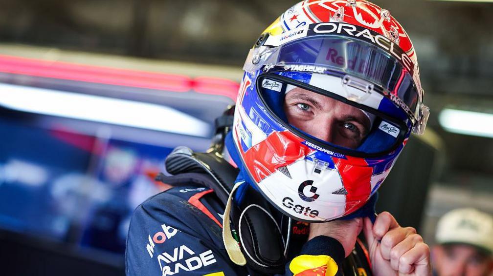 Red Bull's Max Verstappen adjusts his helmet after taking pole position for the United States Grand Prix sprint race