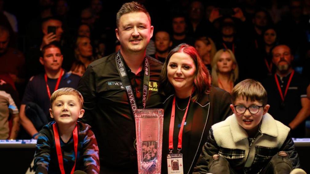 Kyren Wilson with his wife Sophie and their sons