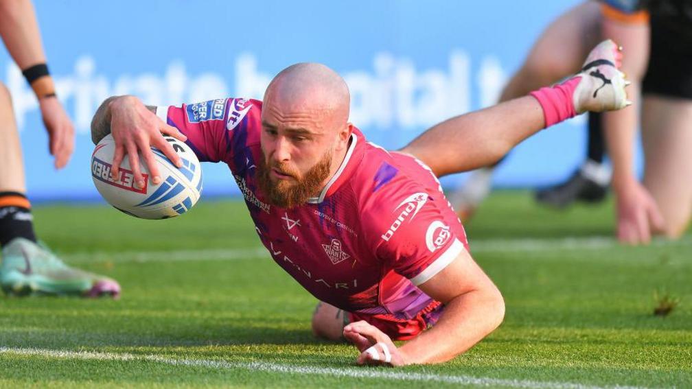 Jake Bibby scores for Huddersfield