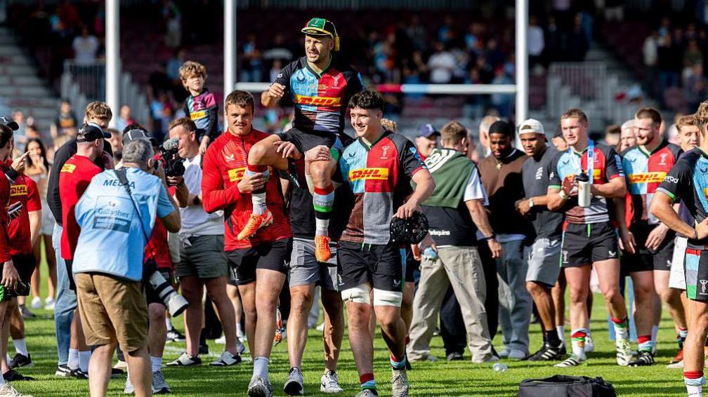 Danny Care lifted in the air after his last game for Harlequins