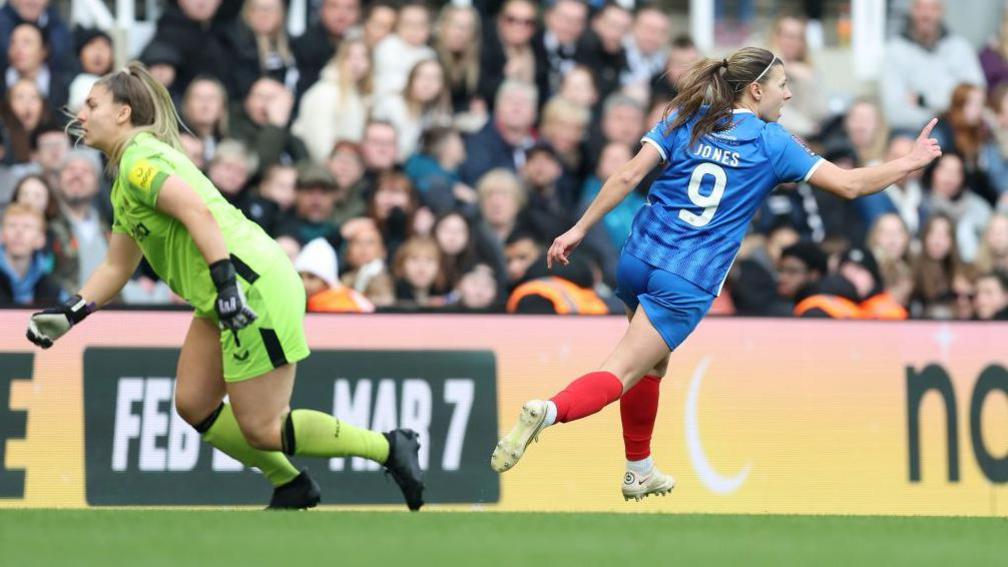 Emma Jones celebrates a goal