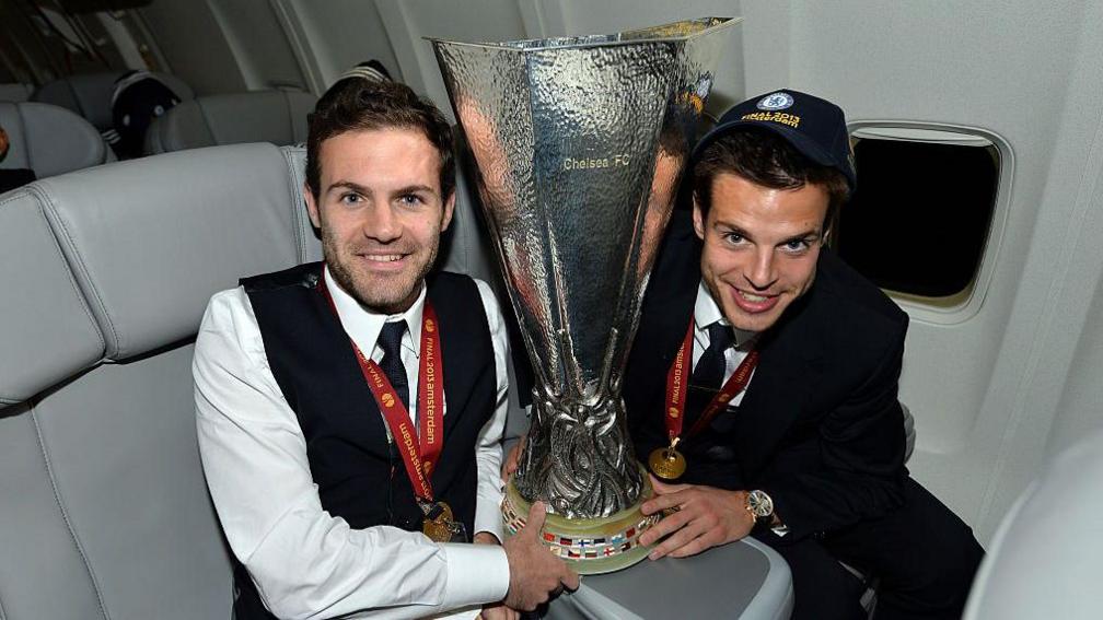 Juan Mata and Cesar Azpilicueta with the Europa League trophy