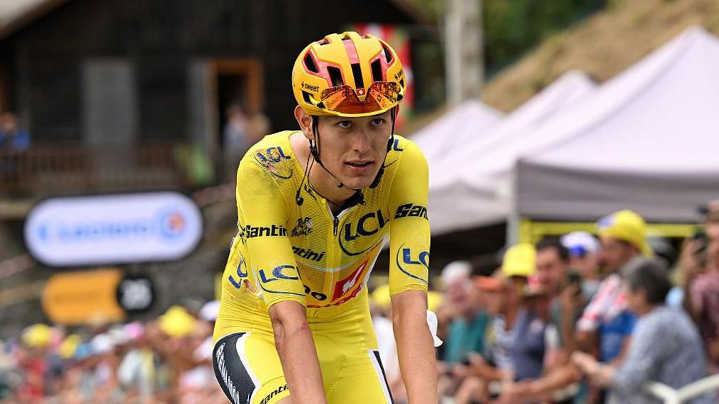 Torstein Traeen arrives with torn Lycra and plenty of bruising on his right shoulder after his crash on the Tourmalet