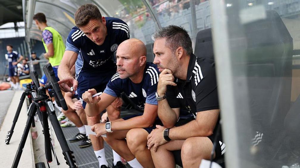 Leicester City manager Martà Cifuentes, Leicester City assistant manager Xavi Calm and Leicester City coach Andy King studying video footage of a game