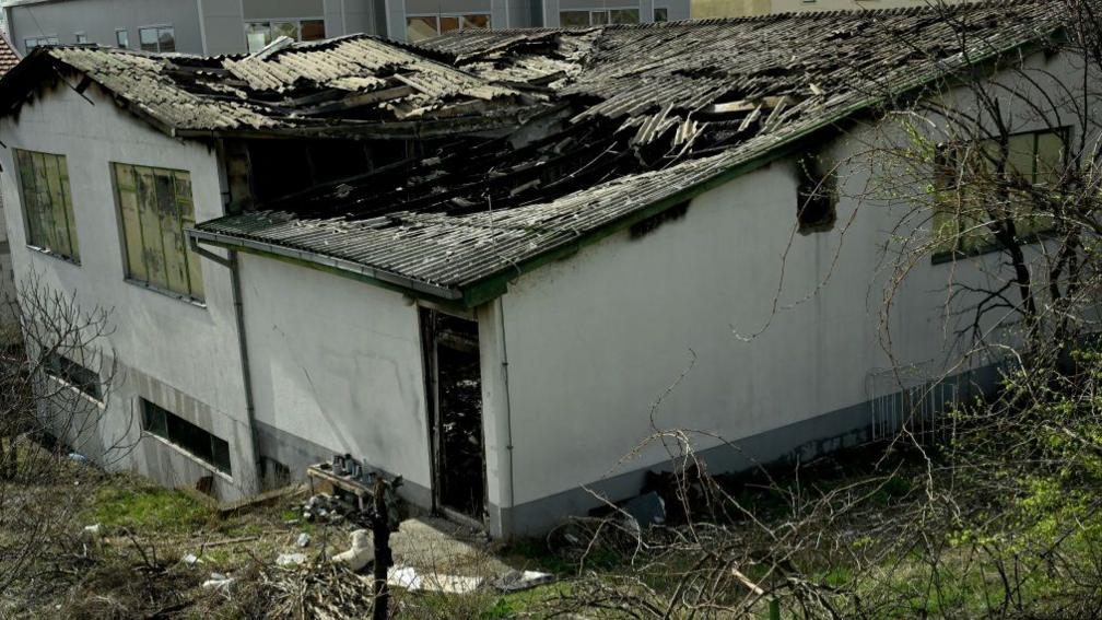 The burnt down nightclub in which a fire broke out and killed 51 people in Kocani, a town some 100 kilometres east of the capital Skopje, on March 16, 2025