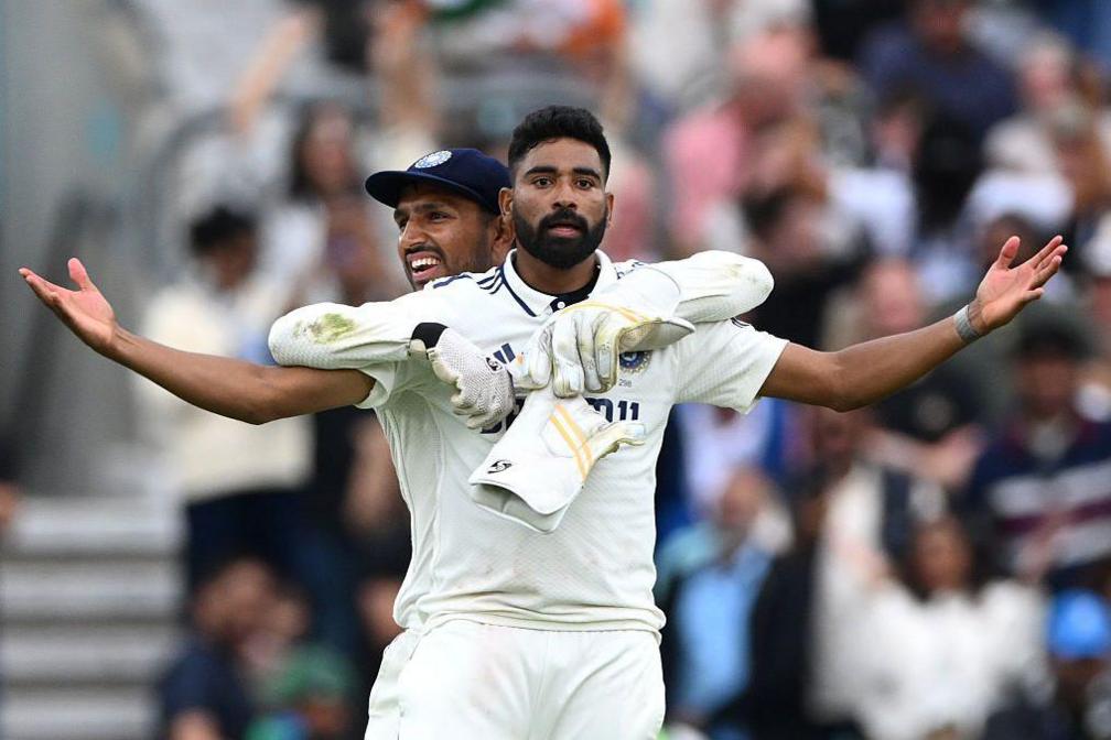 Mohammed Siraj of India celebrates the match winning wicket of Gus Atkinson of England with teammate Dhruv Jurel on day five of the 5th Rothesay Test Match at The Kia Oval.