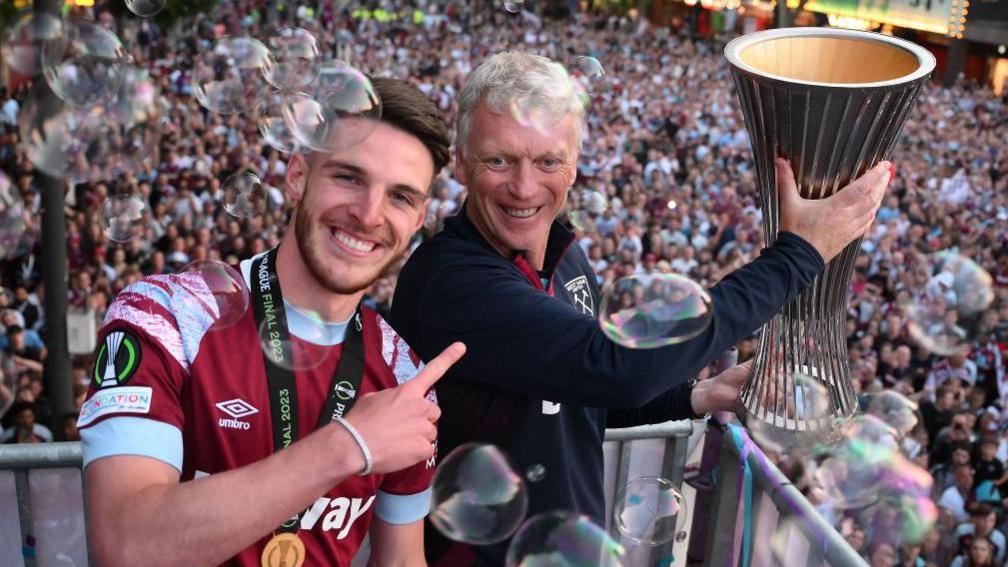 David Moyes and then-captain of West Ham Declan Rice celebrate winning the Europa Conference League with thousands of Hammers fans in London