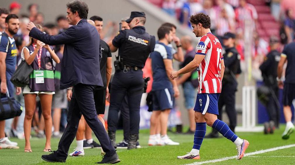 Julian Alvarez heads off the pitch after Atletico's game with Villarreal