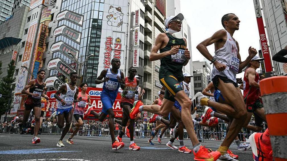 Great Britain's Emile Cairess competes successful nan men's marathon astatine nan World Championships successful Tokyo 