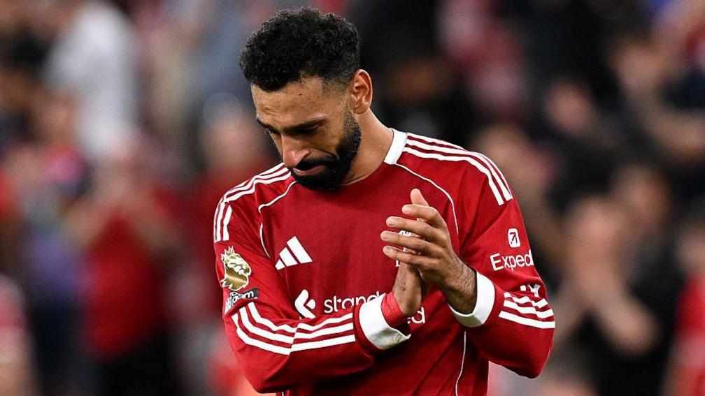 Mohamed Salah tearfully applauds the Liverpool fans following the win against Bournemouth