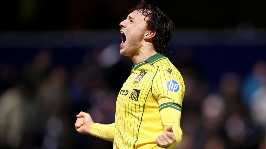 Oliver Rathbone celebrates Wrexham's goal