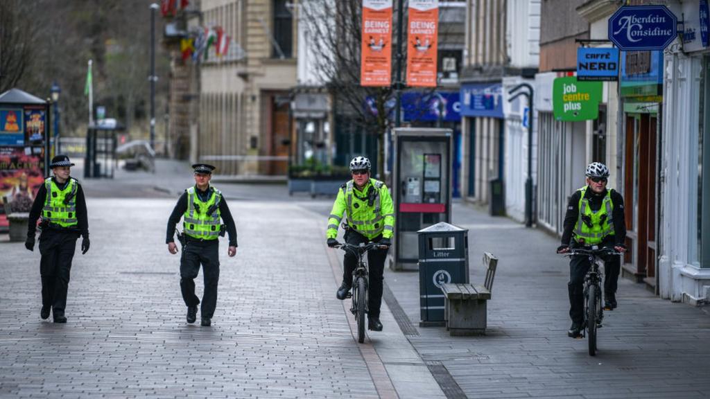 Police officers walking apart in Perth