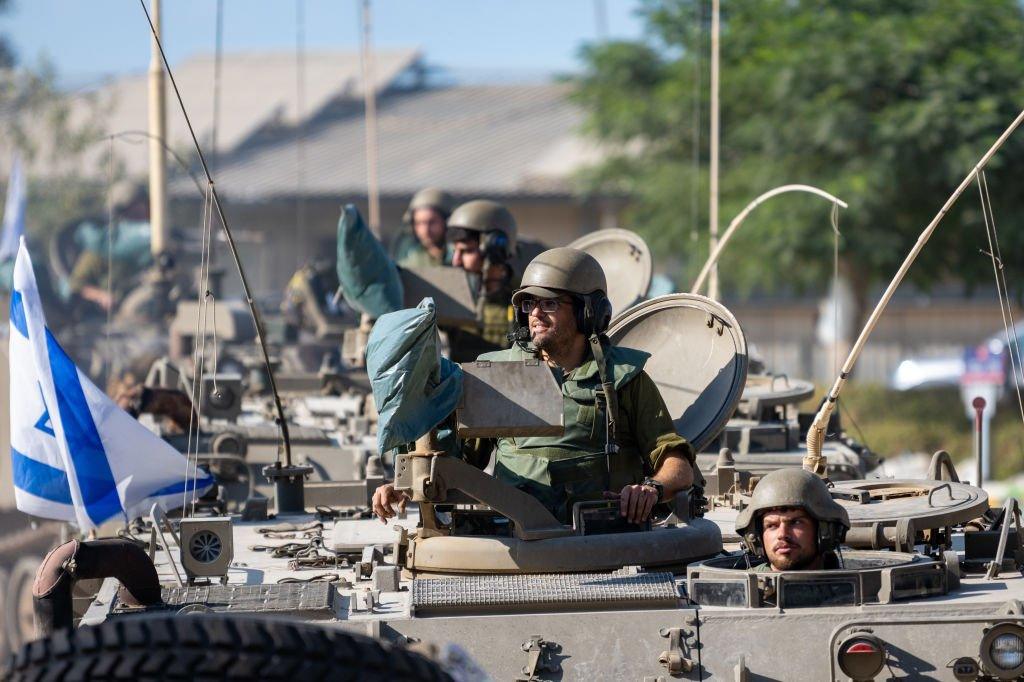 IDF Soldiers ride in armoured personnel carriers