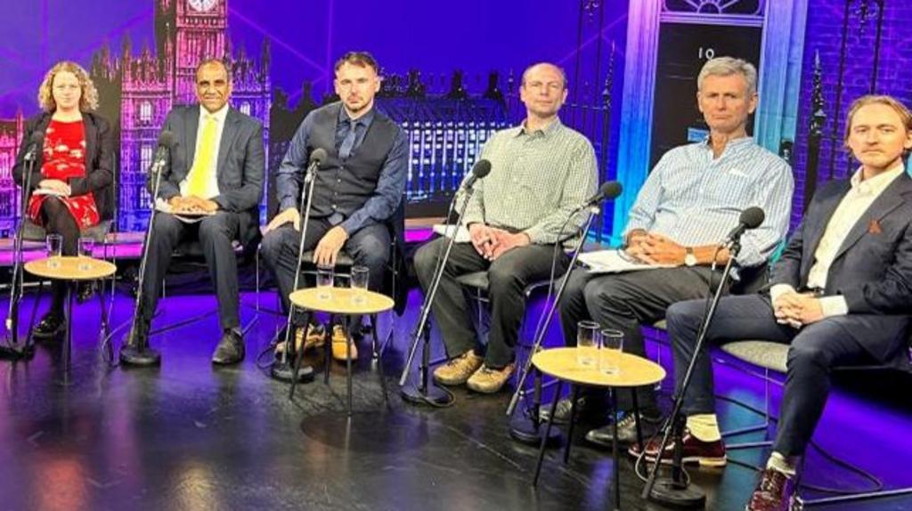 Group shout of electoral candidates sitting in a studio