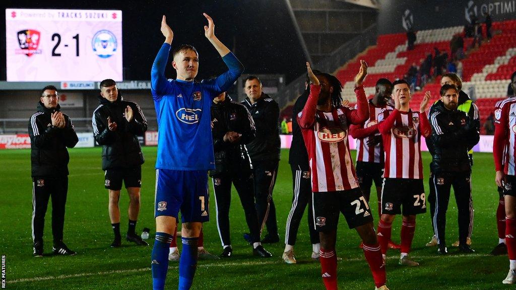 Exeter City celebrate Peterborough win