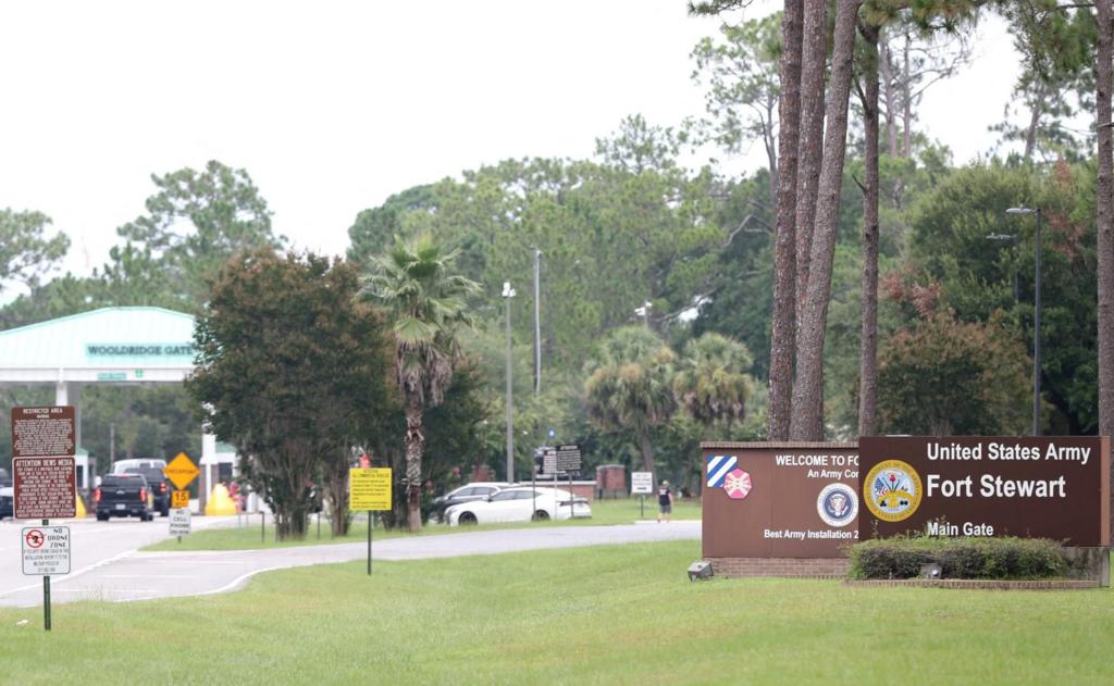 Traffic enters Fort Stewart at the main entrance gate following an active shooter incident on the U.S. Army base located in Hinesville, Georgia