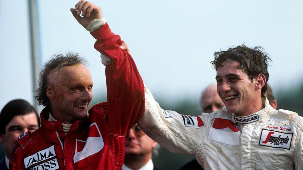 A smiling Ayrton Senna lifts the arm of Niki Lauda after the Austrian won the 1984 race at Brands Hatch with the Brazilian in third. Senna, driving for Toleman, was in his first season of F1 while Lauda won his third world title that year, beating McLaren team-mate Alain Prost by half a point