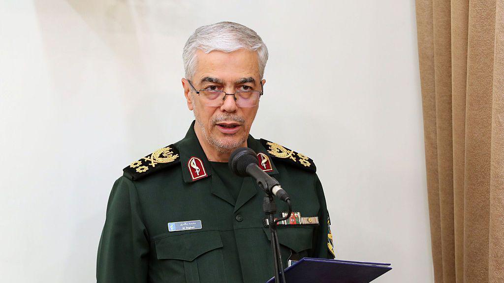 Mohammad Bagheri stands speaking into a microphone