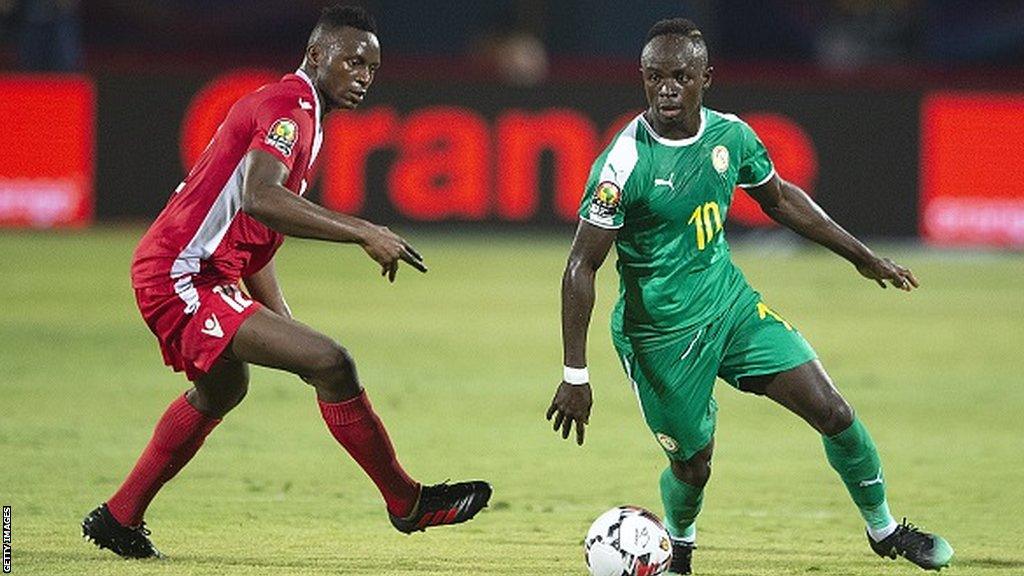 Victor Wanyama of Kenya challenges Sadio Mane of Senegal