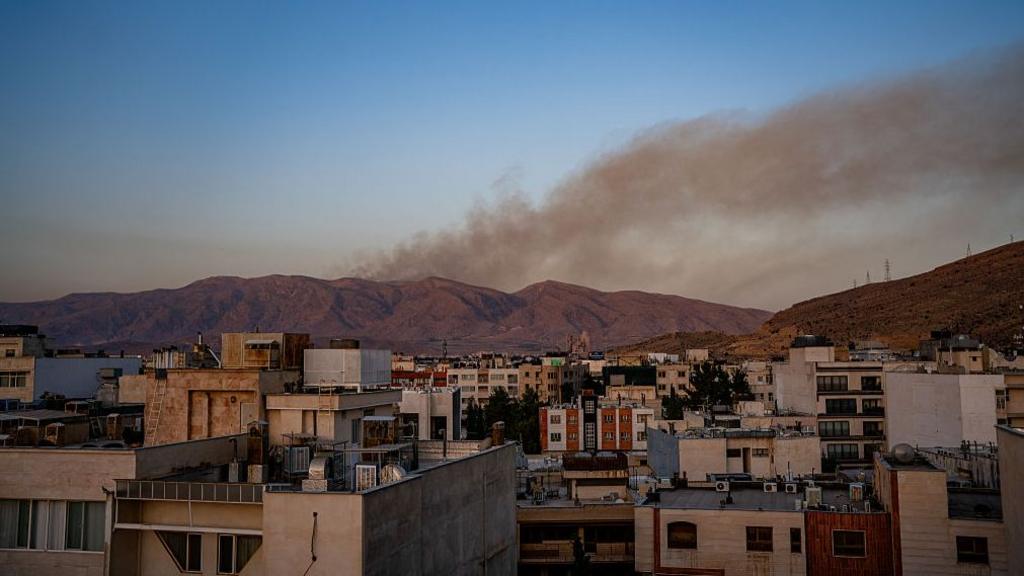 Smoke rises as fire burns in an alleged site of IRGC's missile launch targeted by Israel on the mountains of Shiraz, Iran on Saturday