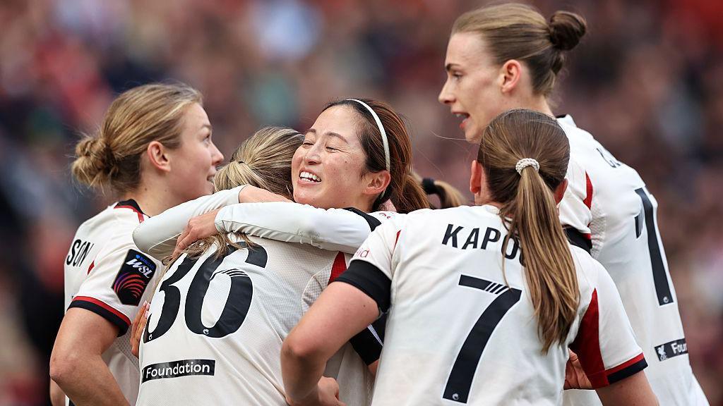 Liverpool celebrate victory over Charlton Athletic