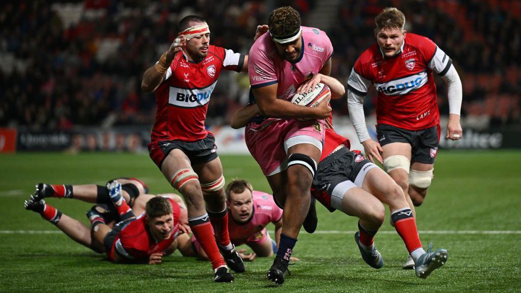 Exeter Chiefs lock Rus Tuima carries the ball against Gloucester