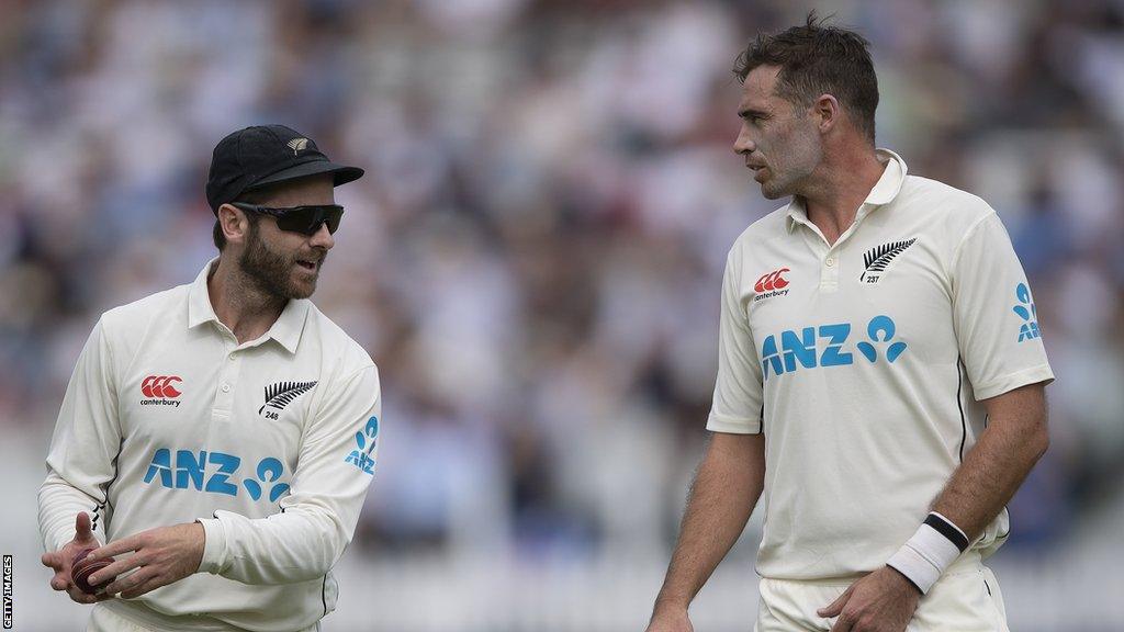 Kane Williamson (left) and Tim Southee (right) talking during a Test match