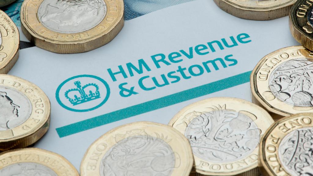 HM Revenue and Customs logo surrounded by coins