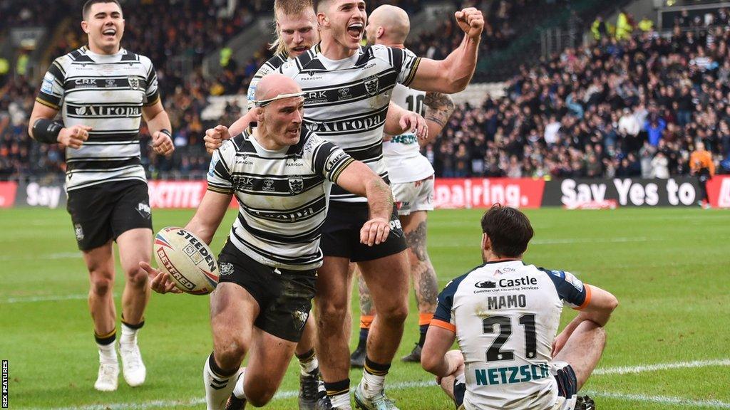 Danny Houghton and his Hull FC team-mates celebrate his second-half try