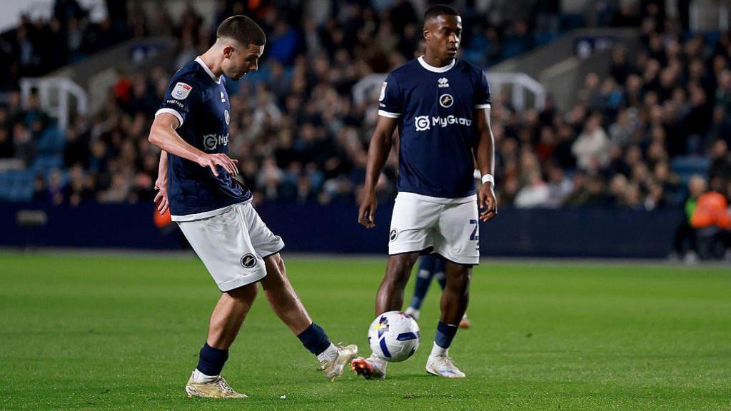 Camiel Neghli takes a free-kick for Millwall