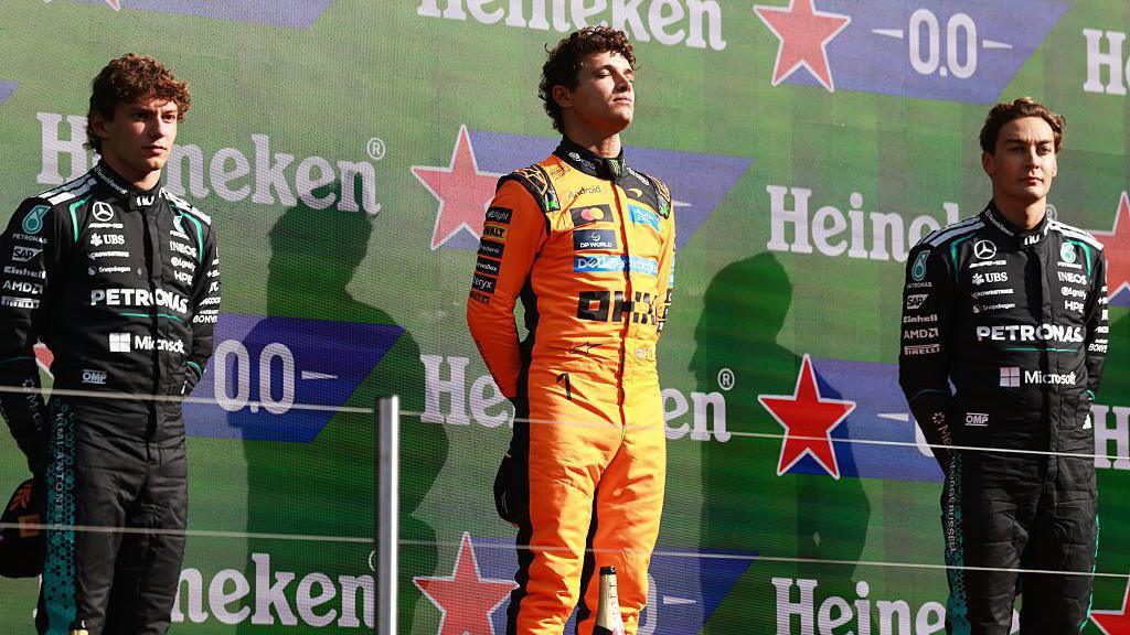 Kimi Antonelli, Lando Norris and George Russell on the podium at Zandvoort