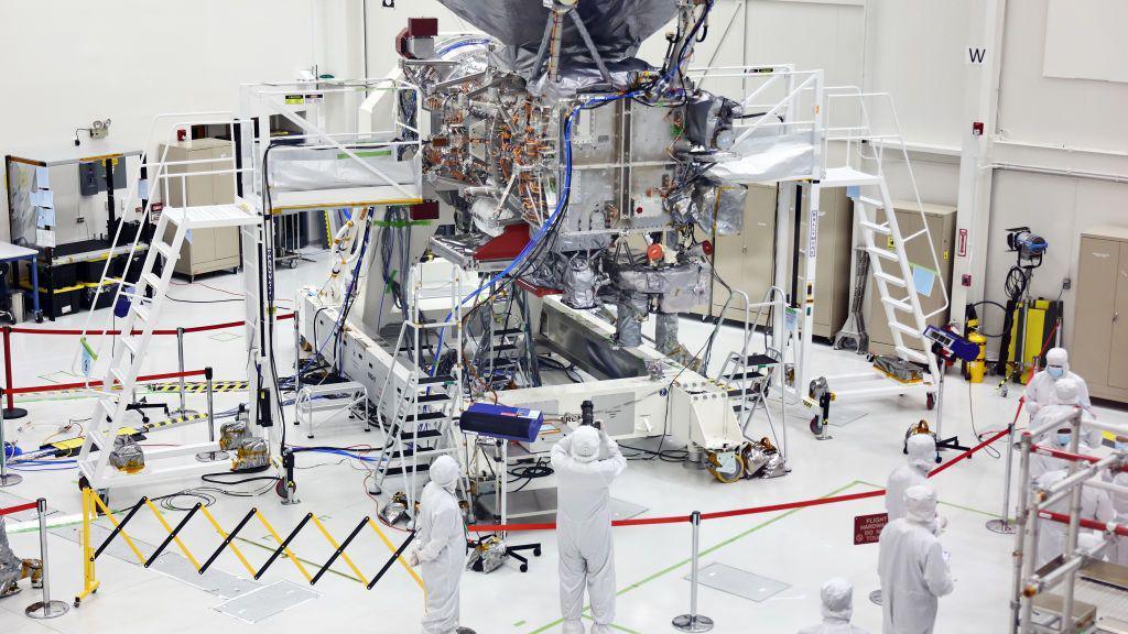 The NASA Europa Clipper spacecraft is viewed during a media tour inside a Spacecraft Assembly Facility clean room at NASA's Jet Propulsion Laboratory (JPL) on April 11, 2024 in Pasadena, California. 