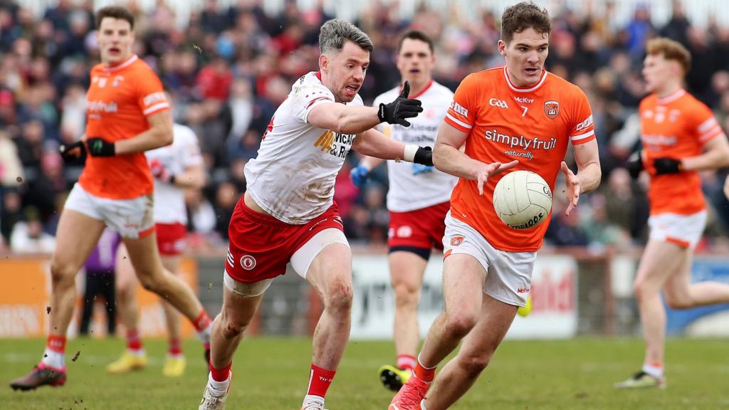 Tyrone's Mattie Donnelly and Armagh's Jarly Og Burns