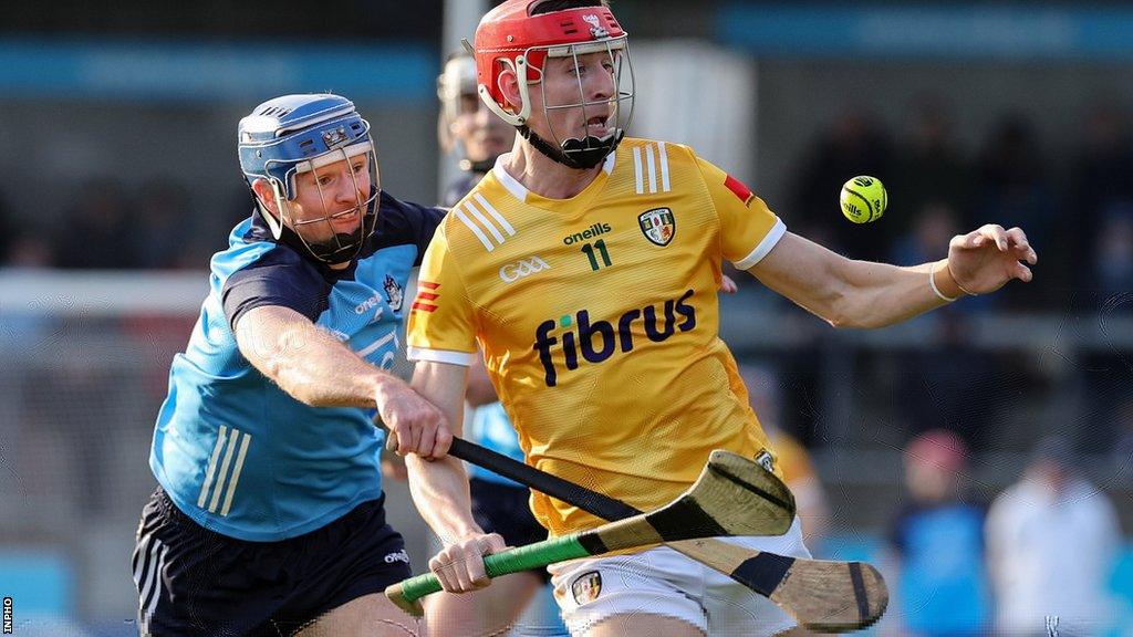 Dublin's Conor Burke challenges Antrim's James McNaughton in the League contest in February