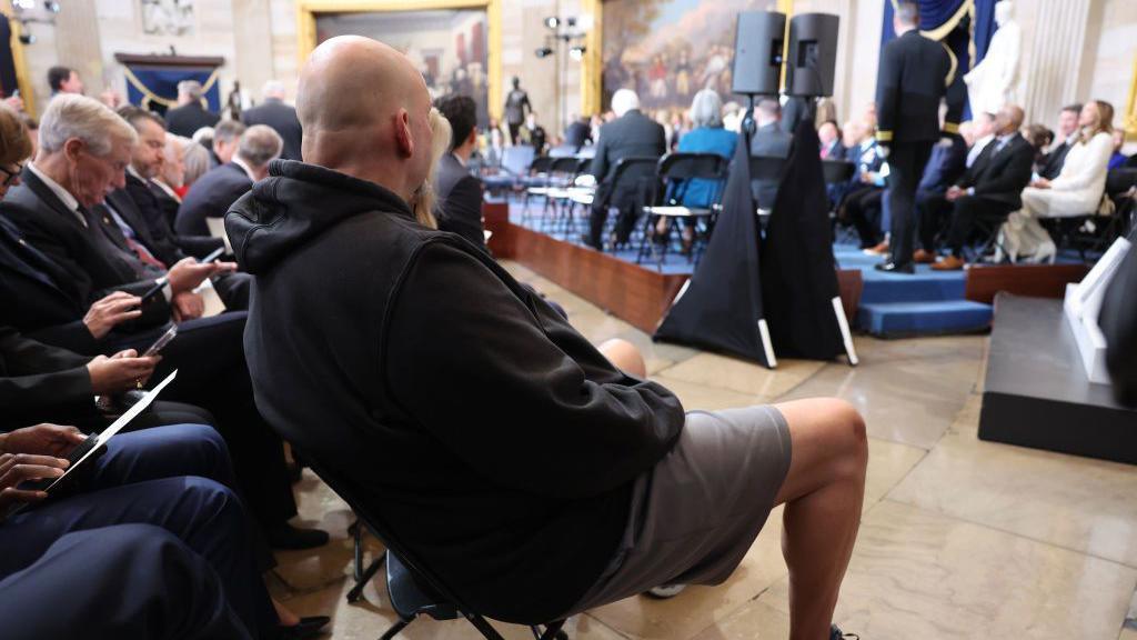 Senator John Fetterman in a shorts and a hoodie