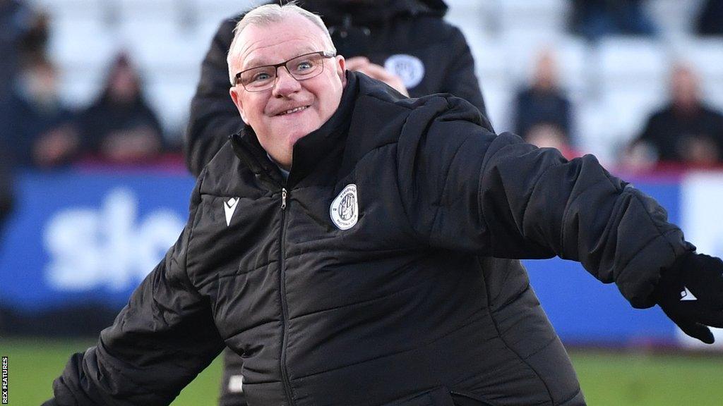 Returning Rotherham boss Steve Evans celebrates