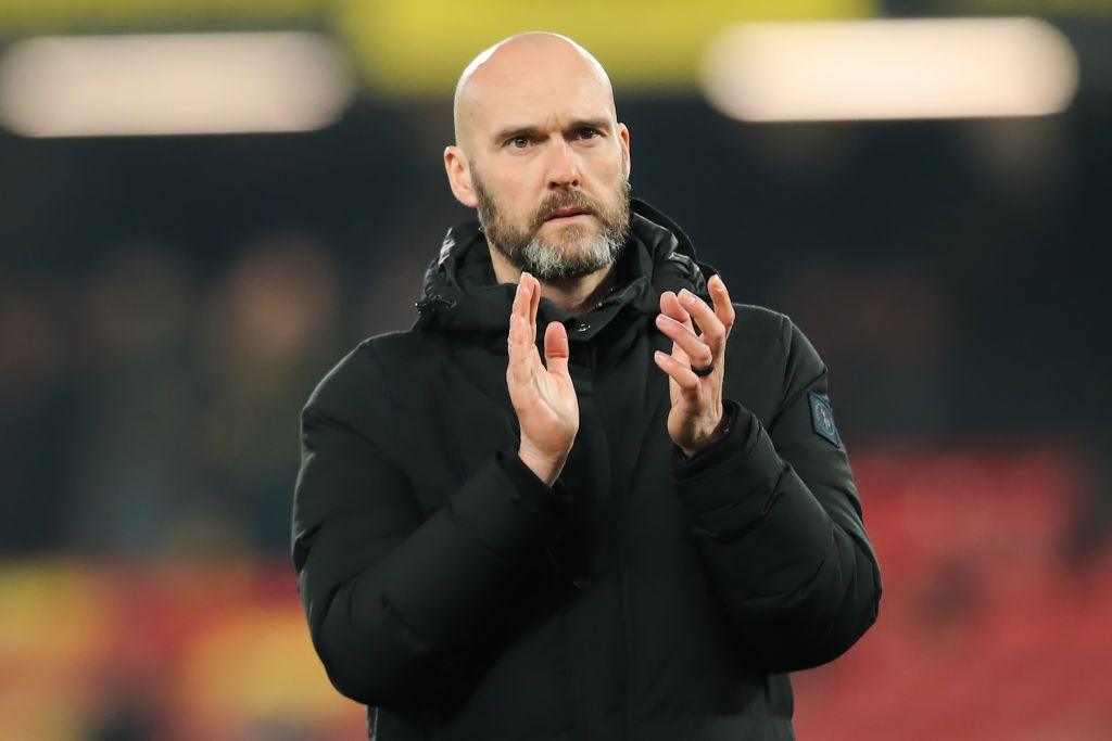 Swansea City head coach Luke Williams applauds supporters