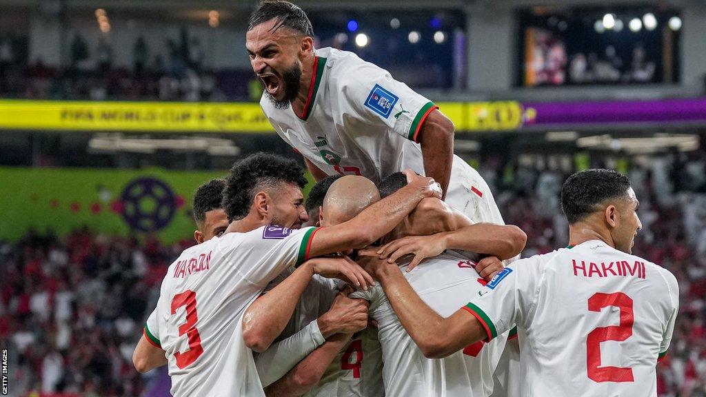 Morocco celebrate scoring against Belgium