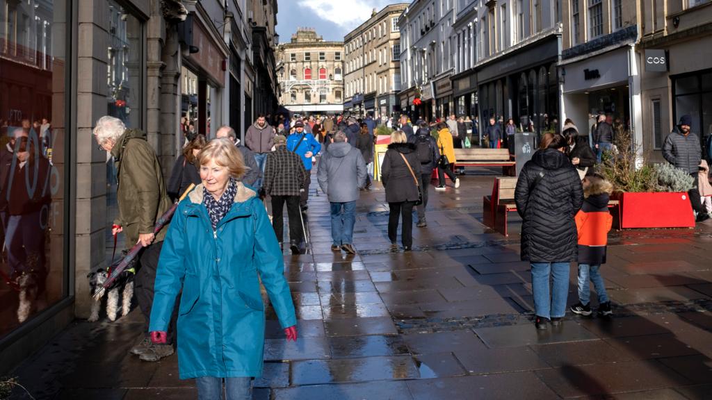 Shoppers and visitors in the city centre on 29 December 2022 in Bath, United Kingdom