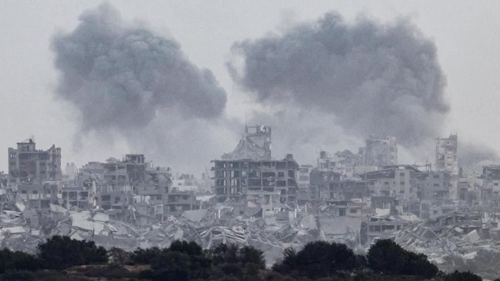 Smoke rises from Gaza after explosions, as seen from the Israeli side of the border with Gaza