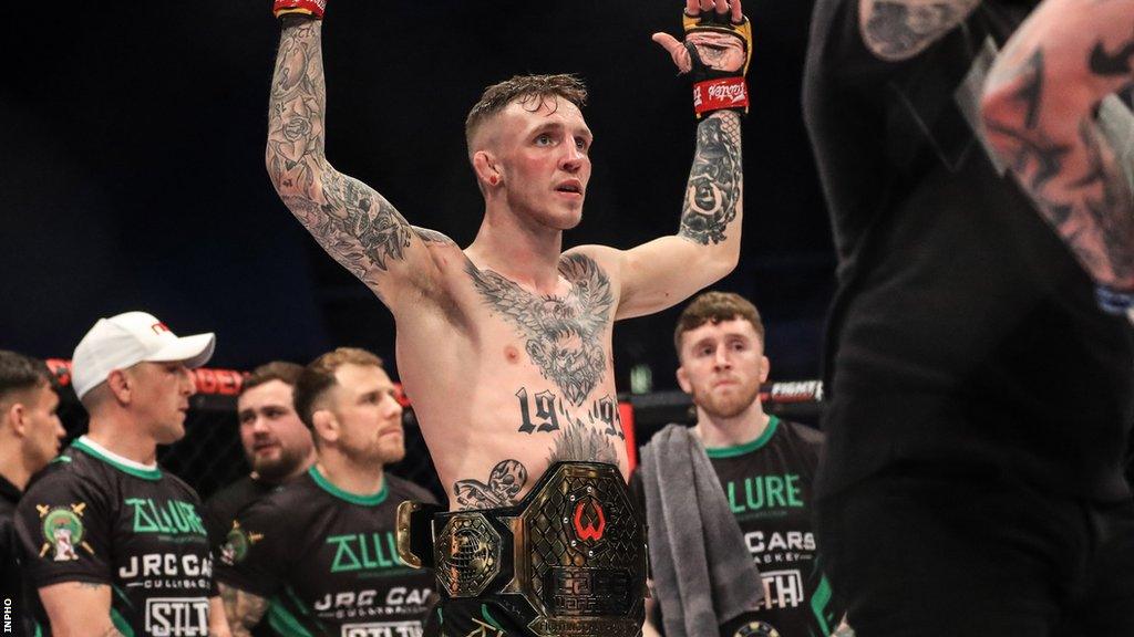 Rhys McKee celebrates defending his title
