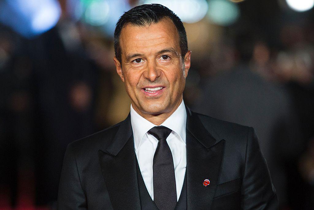 Football agent Jorge Mendes smiles on a red carpet