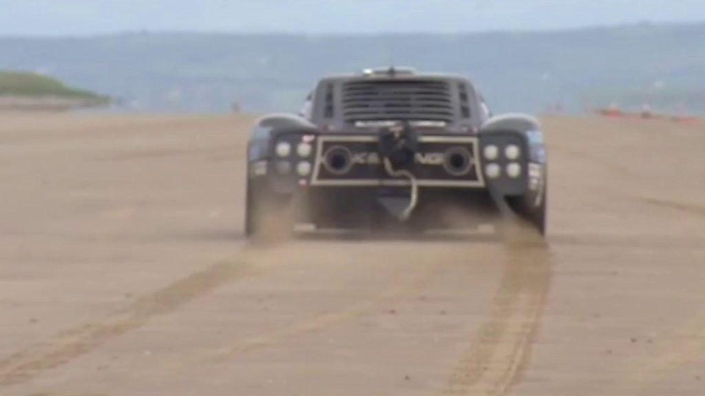 A racing car on Pendine sands