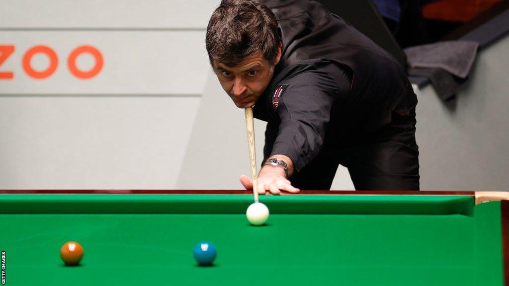 Ronnie O'Sullivan playing against Luca Brecel at the 2023 World Championships