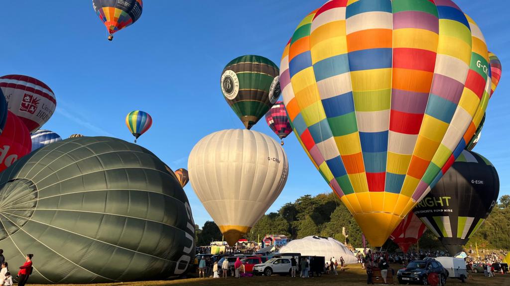 Balloons taking off