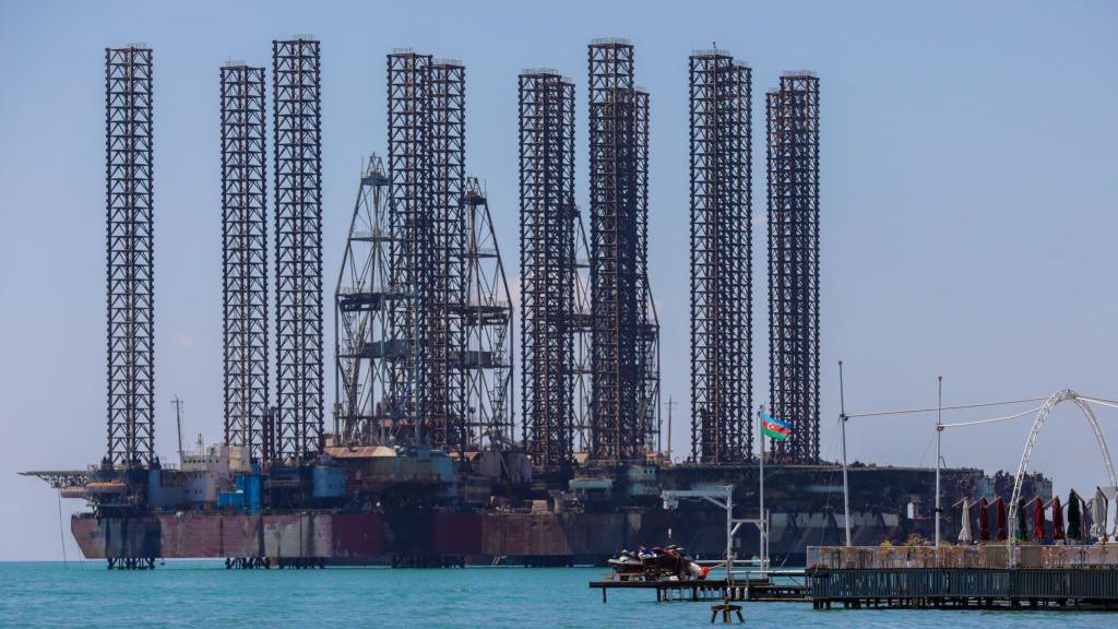 An offshore oil rig is seen in the Caspian Sea near Baku, Azerbaijan